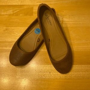 Brown flats with cutout details